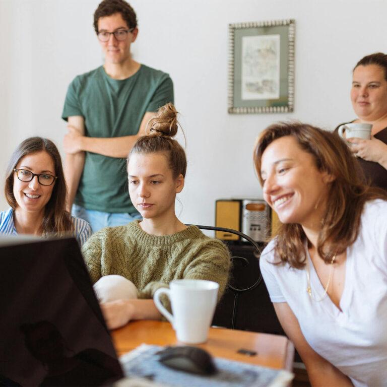 Decidewise decision intelligence sponsorship team at laptop